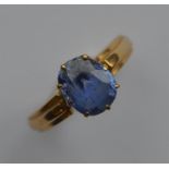 A small 18 carat single stone ring in claw mount.