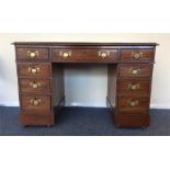 A good mahogany twin pedestal writing desk on pede