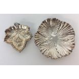 Two Continental silver dishes with fluted mounts.