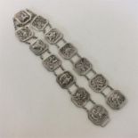 A Chinese silver thirteen panel belt with chain link susp