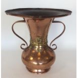 A massive Japanese copper vase with brass overlay.