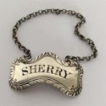 A rare silver Sherry label of curved form on suspension c