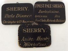 A group of three unusual wooden bin labels each de