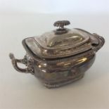 A small Sheffield plated tureen and cover on ball