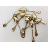 A heavy set of nine French silver gilt spoons. App