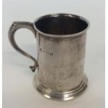 An Edwardian tapering christening cup on spreading