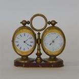 A good quality travelling clock / barometer with w