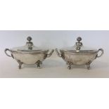 A good pair of George III silver tureens and covers with