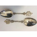 A pair of Dutch silver spoons mounted with Galleons on sw