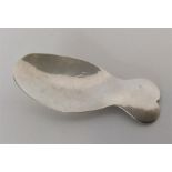 A heavy modern silver caddy spoon of hammered form. Londo