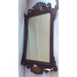 A good mahogany bevel edged mirror with scroll fra