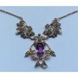 An amethyst and half pearl 14 carat necklace with