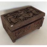 An Antique carved Indian stationery box on turned