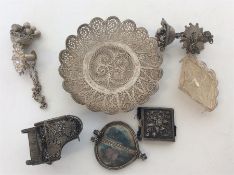 A collection of filigree mounted silver items. App