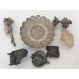 A collection of filigree mounted silver items. App