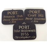 A group of three unusual wooden bin labels each de