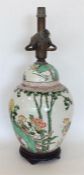 A Chinese style lamp decorated with animals. The v