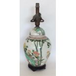 A Chinese style lamp decorated with animals. The v