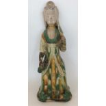 A large pottery tomb figure of a lady. (Possibly T