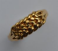 An 18 carat gold keeper ring. Hallmarked for Londo