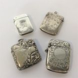Three silver vesta cases together with a plated li
