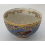 A small Devon lustre pot decorated with gilding. E