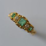 A good emerald and diamond five stone ring in 15 c