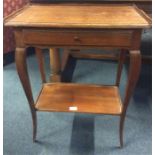 A small Continental single drawer side table with