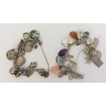 Two heavy silver curb link charm bracelets. Approx