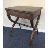 An unusual hinged top card table with turned stret