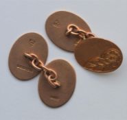 A pair of good 9 carat rose gold cufflinks engrave