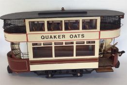 A large handmade Quaker Oats wooden tram. Est. £30
