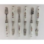 An attractive set of six silver mounted dessert ea