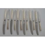 A set of six (plus six) silver handled knives with