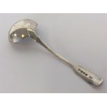 A silver fiddle pattern ladle. London. By TB. Approx. 59