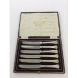 A good boxed set of silver handled knives. Birming