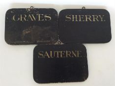 A group of three unusual plain wooden bin labels d
