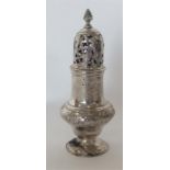 A Georgian embossed silver baluster shaped sugar caster d