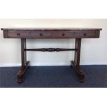 A rosewood library table with two drawers and moul