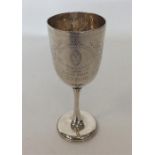An Edwardian silver engraved goblet decorated with scroll