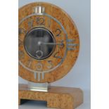 DUNHILL: A stylish mantle clock of circular form o