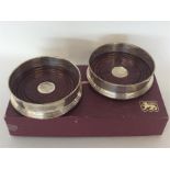 A good pair of silver boxed coasters with wood pan