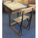 An oak mounted child's school desk. Est. £20 - £30