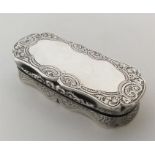 An attractive silver oval snuff box with gilt inte