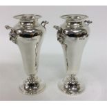 A pair of large tapering silver spill vases with gargoyle