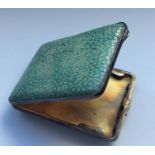 A rectangular hinged top shagreen silver box. Appr