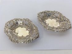 A pair of small boat shaped silver bonbon dishes w