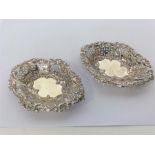 A pair of small boat shaped silver bonbon dishes w
