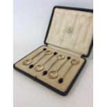 A heavy boxed set of six bean top silver coffee spoons. S