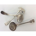 A good heavy group of three silver sifter spoons. Various